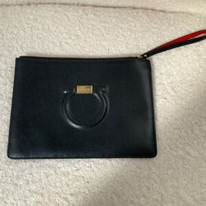 Black Ferragamo leather envelope clutch with strap and contrasting red interior